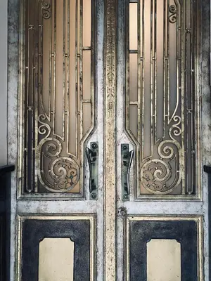 an old wooden door with a metal design on it at Castle Franco Suites in Istanbul