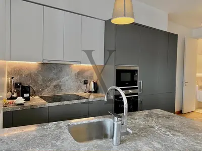 a kitchen with a sink and a counter top at X Flats Vilhelm in Istanbul