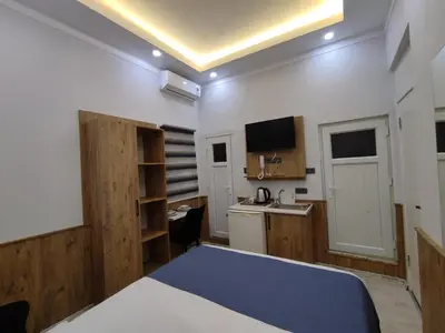 a small room with a bed and a desk at Life Span Hotels in Istanbul