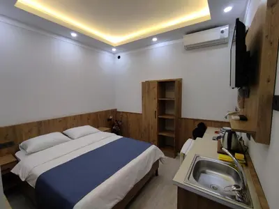 a bedroom with a bed and a sink in it at Life Span Hotels in Istanbul
