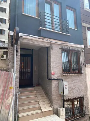 a building with stairs leading up to a door at Istanbul Hub Flats in Istanbul