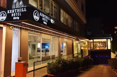 a building with a sign that reads reptilian night city at Kerthill Hotel in Istanbul
