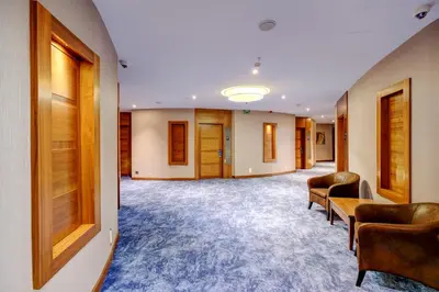 a hallway with chairs and tables in a building at Days Hotel by Wyndham Istanbul Maltepe in Istanbul