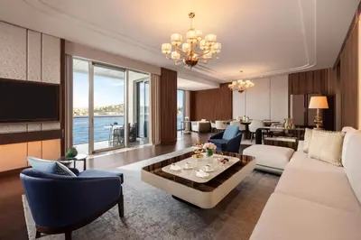 a living room with a couch and a table at Mandarin Oriental Bosphorus, Istanbul in Istanbul