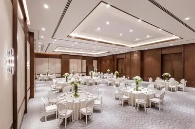 a banquet hall with white tables and chairs at Mandarin Oriental Bosphorus, Istanbul in Istanbul