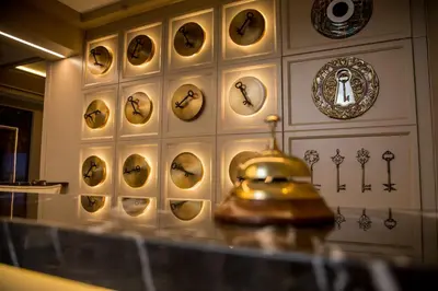 a wall with a bunch of plates on a wall at The Charm Hotel - Old City in Istanbul