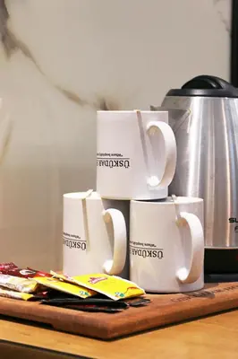 a pile of coffee mugs sitting on a table at ÜSKÜDAR OTEL in Istanbul