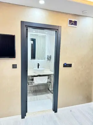 a bathroom with a sink and a mirror at Garden House in Istanbul