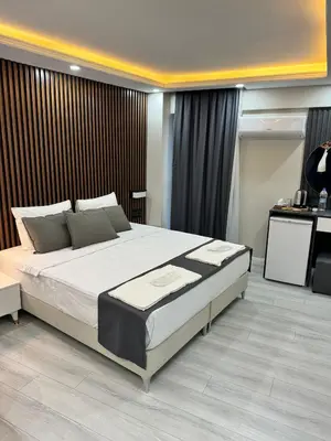 a bedroom with a large bed in a room at Garden House in Istanbul