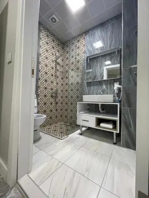 a bathroom with a sink and a toilet at Taksim Galatist Hotel in Istanbul