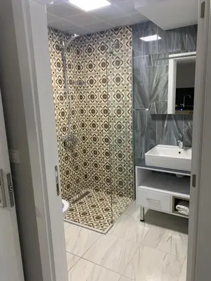 a bathroom with a shower and a sink at Taksim Galatist Hotel in Istanbul
