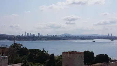 a view of a large body of water with a city at Hotel Peninsula in Istanbul