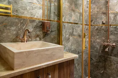 a bathroom with a sink and a shower at The Ottoman in Istanbul