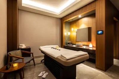 a spa room with a bed and a mirror at Birun Ada Hotel in Istanbul