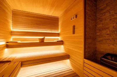 a sauna with wooden walls and wooden flooring at Birun Ada Hotel in Istanbul