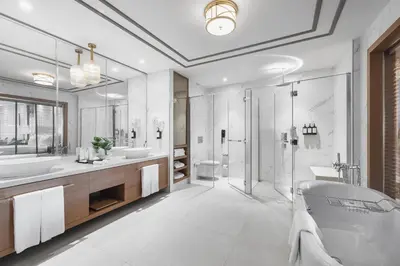 a bathroom with two sinks and a tub and a shower at Birun Ada Hotel in Istanbul
