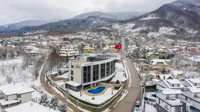 an aerial view of a city in the snow at Aileena Hotel & Villas in Kartepe