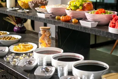 a buffet with different types of food on a table at THE NOVA HOTEL in Yalova