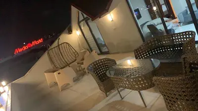an overhead view of a restaurant with a table and chairs at Royal Residence Bursa in Bursa