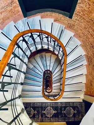 a spiral staircase in a building with a window at RUZ Hotels in Istanbul