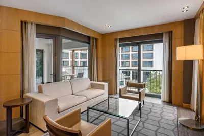 a living room with a couch and a table at Radisson Blu Hotel & Spa, Istanbul Tuzla in Istanbul