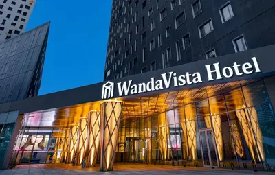 a building with a sign for a hotel at Wanda Vista Istanbul in Istanbul