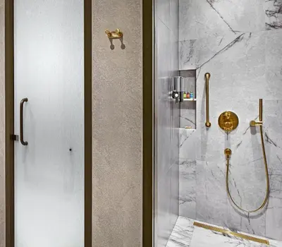 a bathroom with a shower with a glass door at Wanda Vista Istanbul in Istanbul