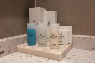 a group of four products on a counter in a bathroom at The Pearl Suites in Istanbul
