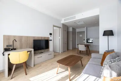 a living room with a couch and a table at Antwell Suites in Istanbul