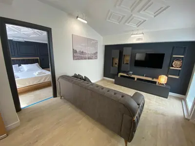a living room with a couch and a bed at RW BOUTIQUE HOTEL in Istanbul