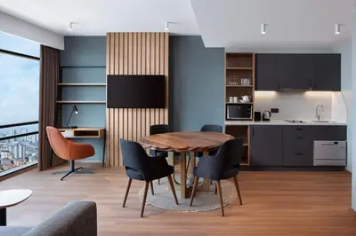a kitchen and dining room with a table and chairs at Residence Inn by Marriott Istanbul Atasehir in Istanbul