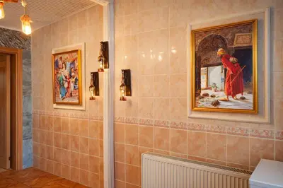 a bathroom with a painting on the wall at Alpacino Apart Hotel in Istanbul