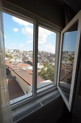 a window with a view of a city at Marida Residence - Istanbul Taksim in Istanbul