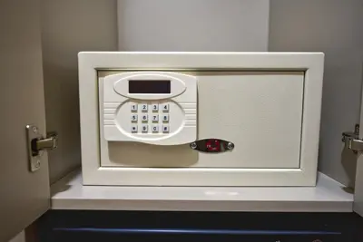 a white safe with a phone inside of it at Florina Hotel in Istanbul