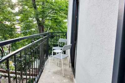 a pair of chairs sitting on a balcony at Florina Hotel in Istanbul