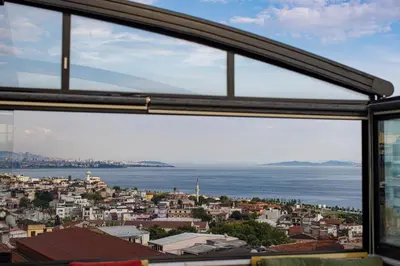 a view of a city from a window at Grand Balyan Hotel & Restaurant in Istanbul