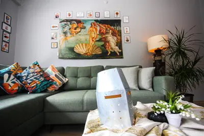 a living room with a couch and a table at Bahçeli Concept Sapanca in Sapanca