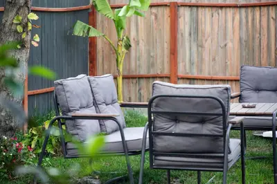two chairs and a table in a yard at Sapanca Glamping in Sakarya