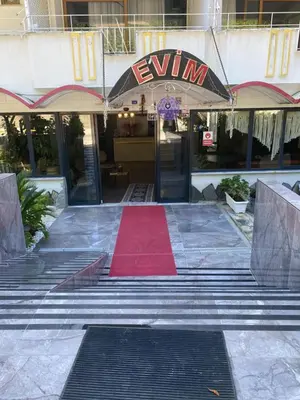a red carpet in front of a building at EVİM APART HOTEL in Termal