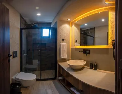 a bathroom with a sink and a toilet and a shower at Villa Siesta Hotel Istanbul Airport in Karaburun