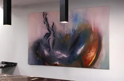 a painting of a woman on a wall at Xenia Hotel Istanbul in Istanbul