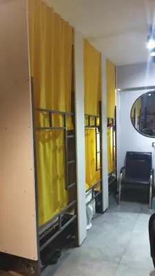 a room with yellow walls and a yellow closet at Gafa Garden Hostel & Apartments - Great Location in Istanbul