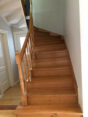 a staircase with wooden steps in a home at White Island Boutique Otel in Adalar