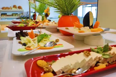 a table with several plates of food on it at The Sign Degirmen Hotel&Spa Wellness in Istanbul
