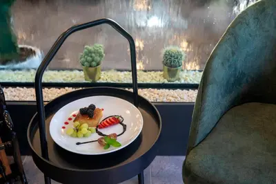 a plate of food on a table in a restaurant at LAGUN CASTLE HOTEL&SPA in Yalova