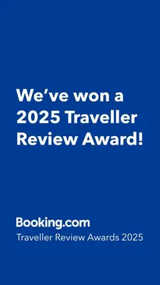 a blue sign that says weve won a traveler review award at Superior refurbished flat in the heart of Istanbul in Istanbul