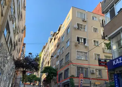 a tall building in the middle of a city at Superior refurbished flat in the heart of Istanbul in Istanbul
