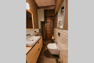 a bathroom with a toilet and a sink at Galadoo Suites 3rd Floor in Istanbul