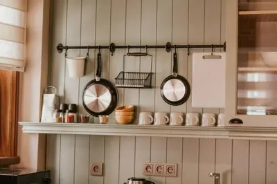 a kitchen with two mirrors on a wall at Galadoo Suites 3rd Floor in Istanbul