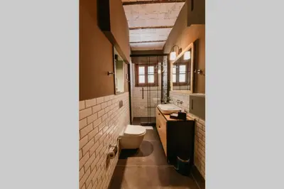 a bathroom with a toilet and a sink at Galadoo Suites 3rd Floor in Istanbul